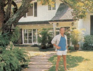 Richard outside his home